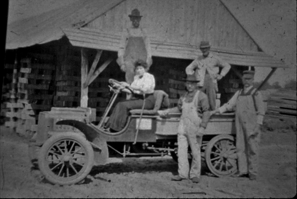 Old Hicksville NY..Louise Augustin in the lumberyard, 1856 - 1942 photo