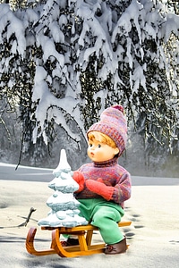 Porcelain doll fir tree sleigh ride