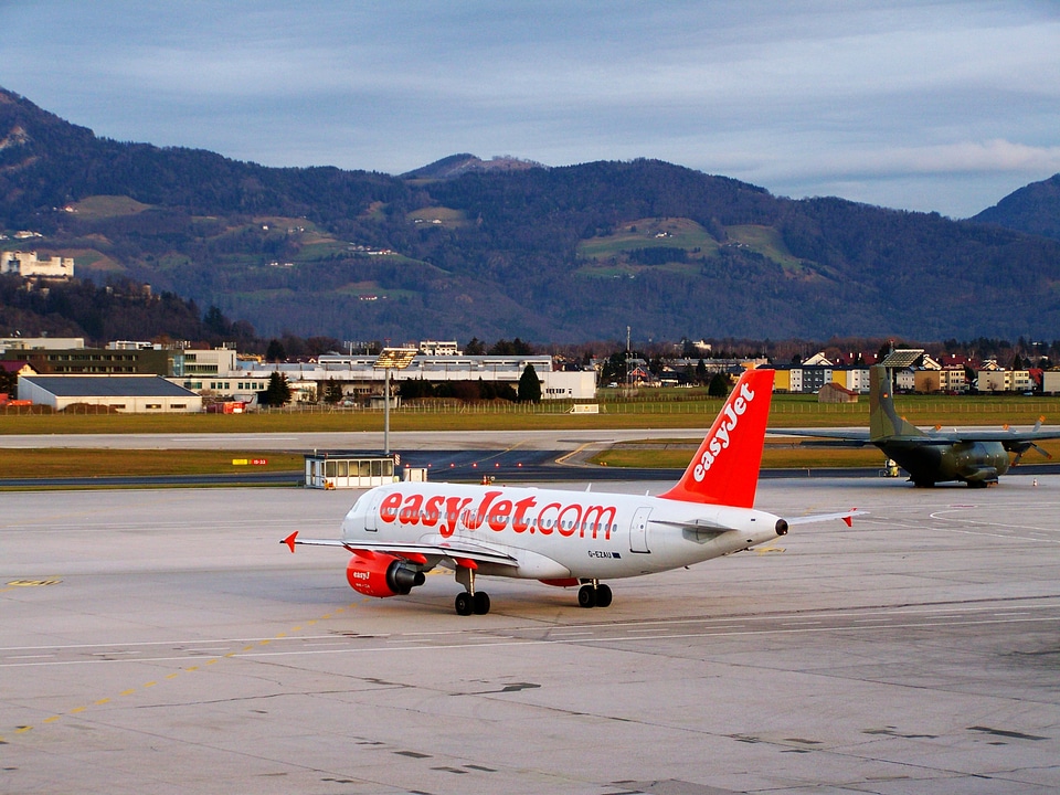 Aircraft airport salzburg white-red airplane