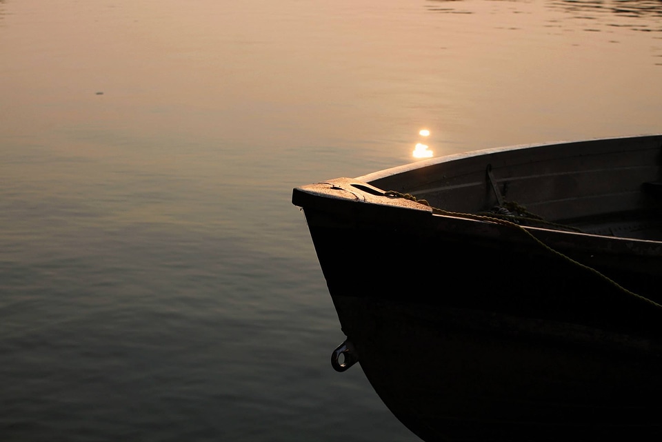 Boat water sunset photo