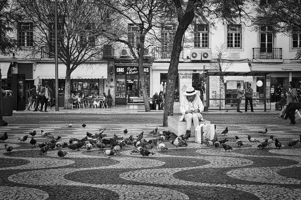 Black and white feeding person