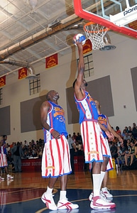 Players dunk exhibition photo