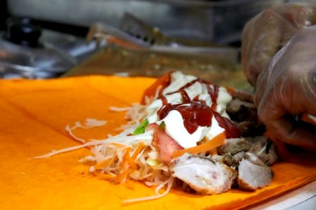 Shaurma with shish kebab in cheese pita bread