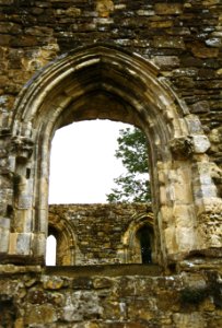 arches in ruined church wall photo