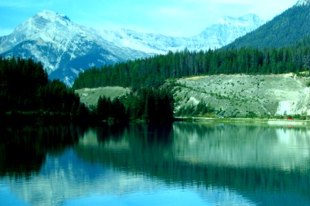 lake with trees and mountains photo