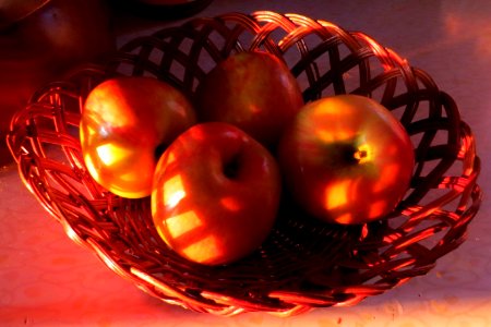 sunset apples in basket photo