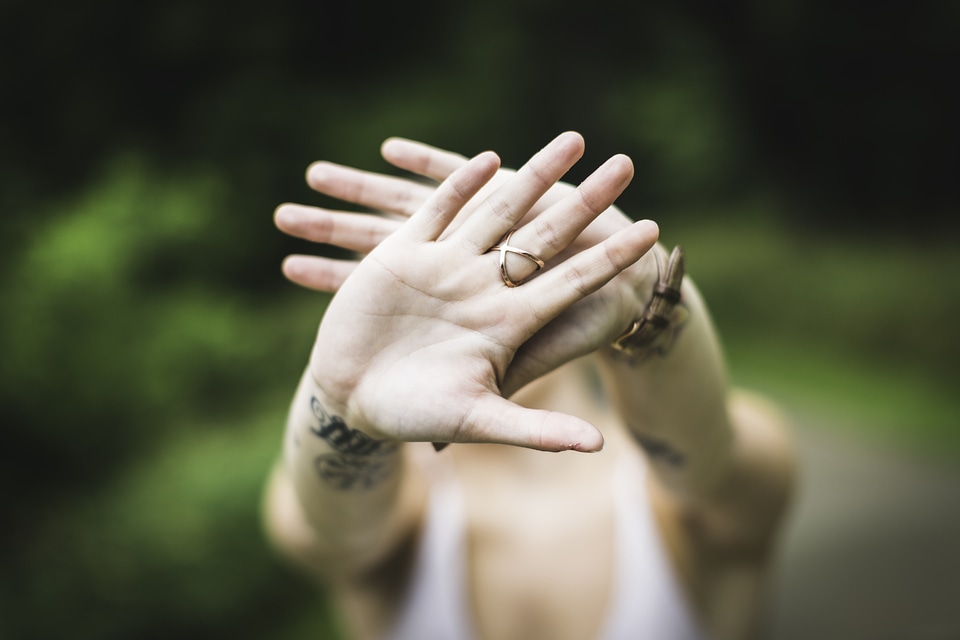 Hands hiding face protect
