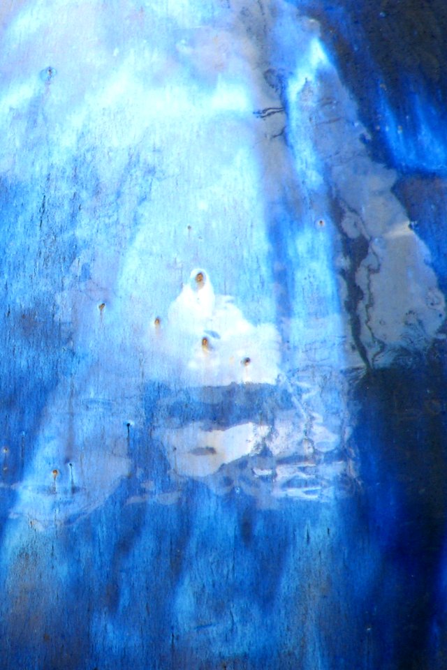 women in white saris (pottery)