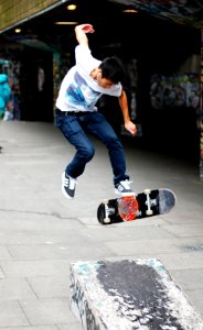 Skater Doing Kickflip photo