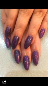 Acrylic Infills finished with purple rain in Spain and magenta glitter gel polish.#long pointed almond.