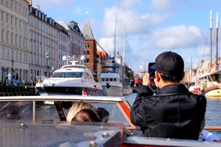 Tourist Taking Photos on Copenhagen Canal Tour photo