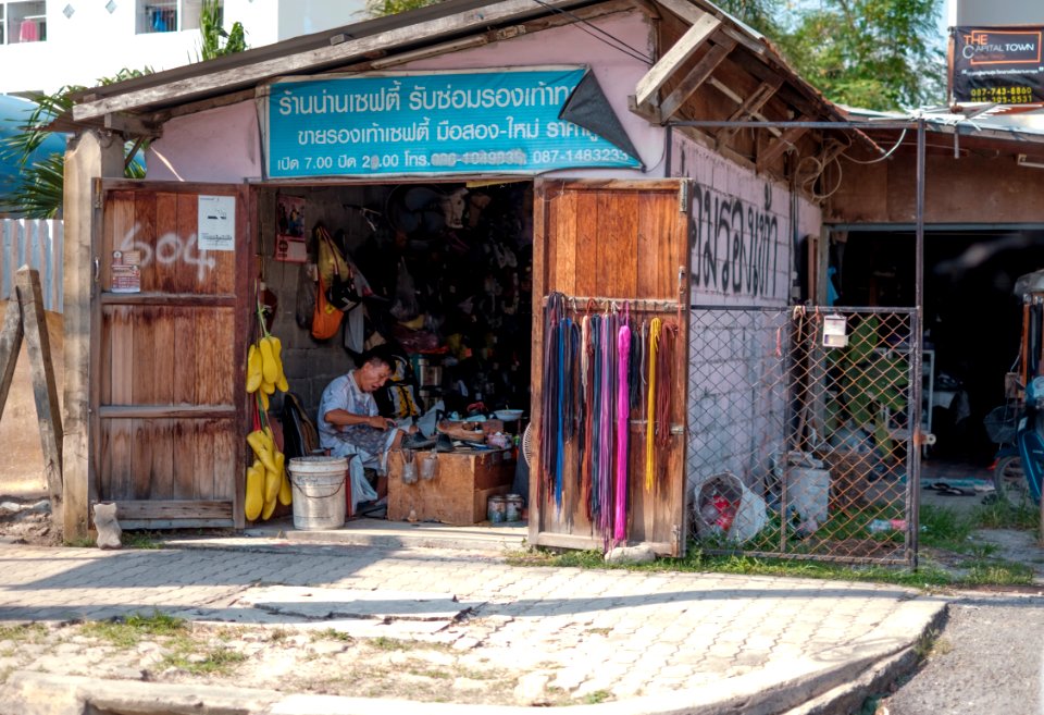 Shoemaker at work, Rayong, Thailand
