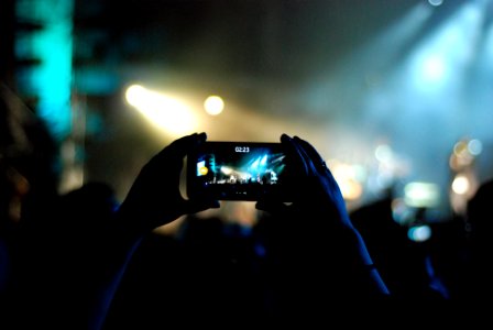 Music Fans Film Concert Show with Smart Phones photo