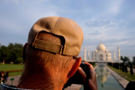 Man Taking Photos of Taj Mahal