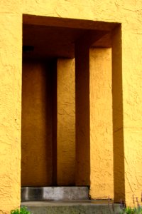 nested mustard-colored entrance