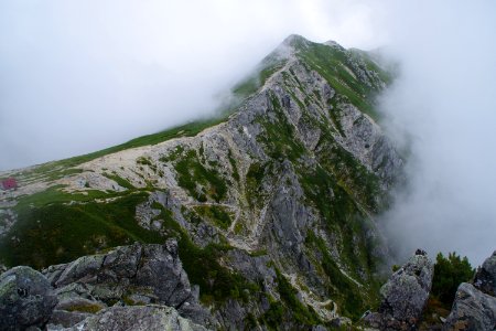 The trail in the clouds photo