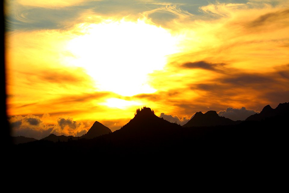stunning golden sunset, over the ranges of Tairua, Coromandel New Zealand