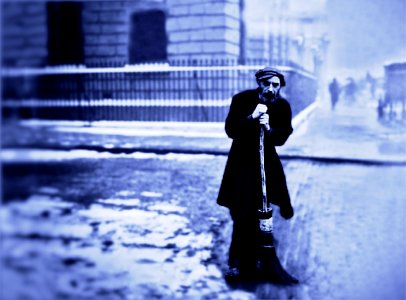 MAN SWEEPING BLUE SPOT