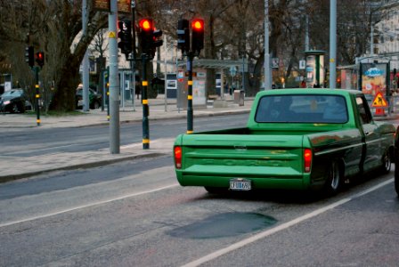 Green Lowrider Pickup Truck on Stockholm's Streets photo