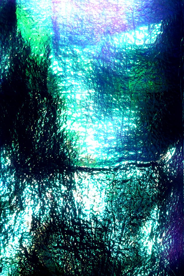 shiny wrinkled blue paper