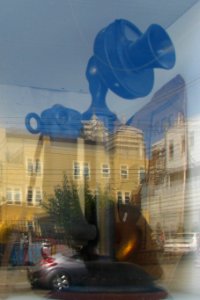 old telephone with city reflection