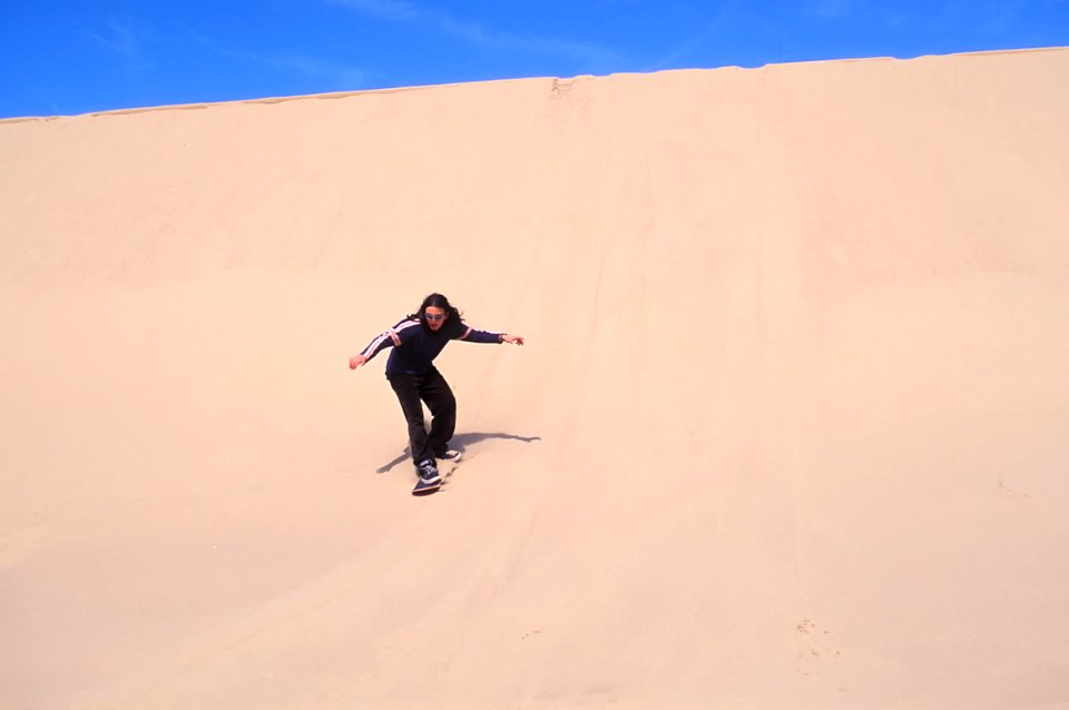 Man Sandsurfing on the Oregon Dunes, Siuslaw National Forest