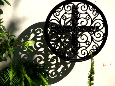 circular metal design with shadow photo
