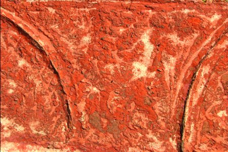 red-orange stucco wall