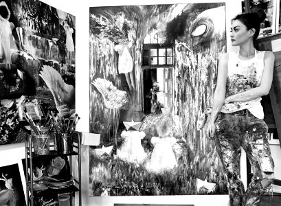 Maxine Syjuco painting in her studio photo