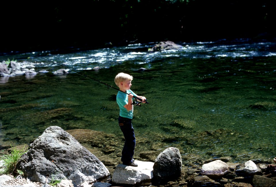 Boy fishing Clackamas River Mt Hood National Forest