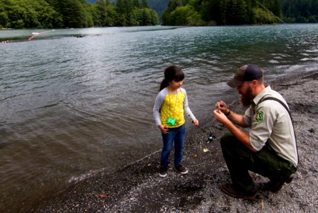 Forest Service Employee helping Young Girl Bait Fishing Line at Baker Lake, Mt Baker Snoqualmie National Forest