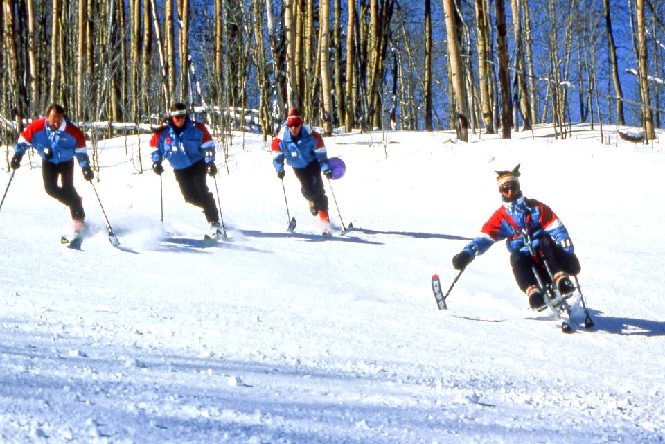 Group of Disabled Skiers using Adaptive Equipment