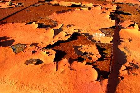desert floor (peeling paint on car)