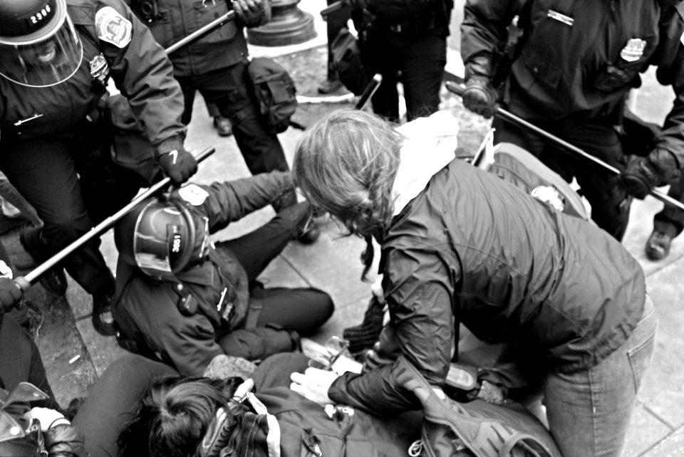 Riot police clash with protestors at Trump inauguration in Washington DC