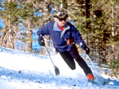 Disabled Man using Para Alpine Ski Poles photo