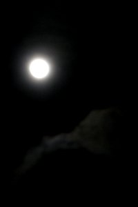full moon in cloudy sky 2 photo