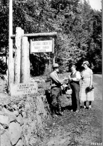 Ranger Issuing Campfire Permit, Eagle Creek RS, Mt. Hood NF, OR 1936 photo