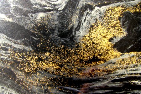 gold speckles on rock photo