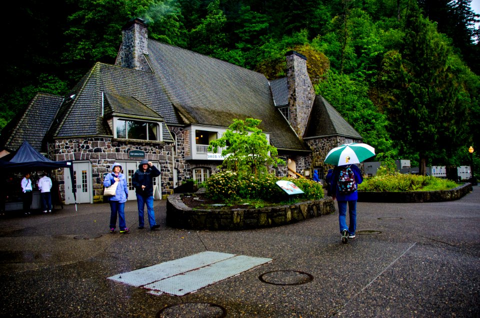 Woman with Umbrella at Multnomah Falls Lodge-Columbia River Gorge