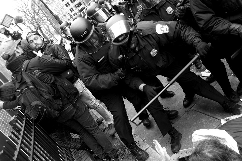 Riot police and protestors at Trump inauguration in Washington DC