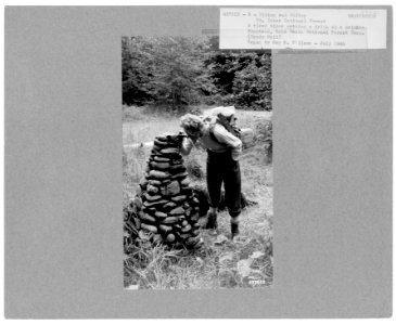 437622 Hiker at Drinking Fountain, Gold Basin Forest Camp, Mt. Baker NF, WA 1945