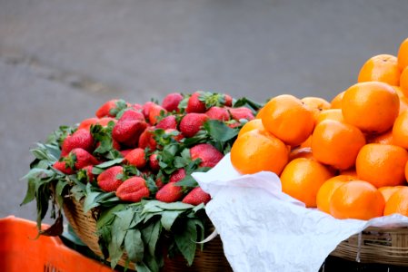 Strawberries and Oranges for Sale in Baskets photo