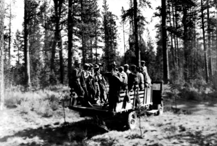 Fire Fighters Riding on Truck