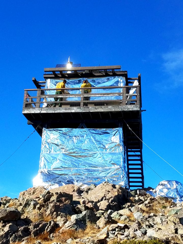 Goat Peak Lookout wrapped against Diamond Creek Fire, Photo by Robert Whitall