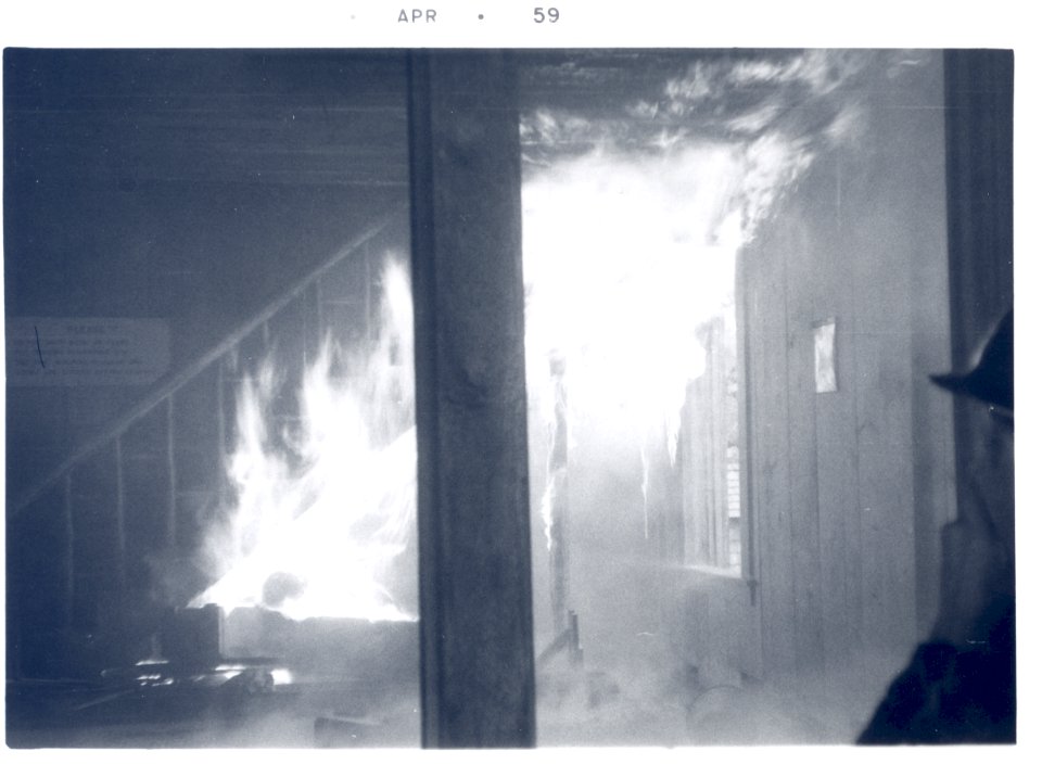 PO-40-3201- Old Denny Creek Ranger Station fire starting- April 1959