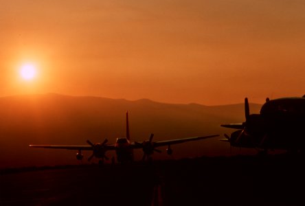 510 Wenatchee Pangborn field tankers as sun rises through smoke