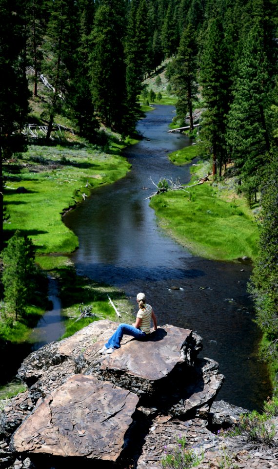WOMAN HIKER LOOKING AT MALHEUR RIVER-MALHEUR