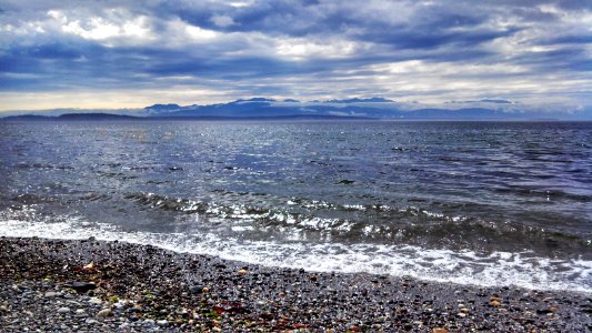 The Olympic Mountains beckon PNT hikers westward from the shore of Puget Sound