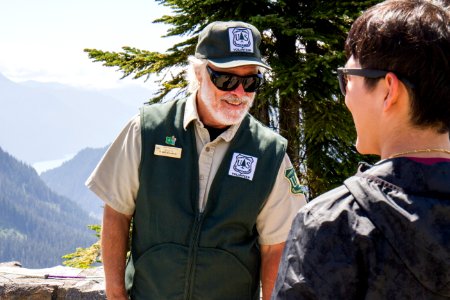Forest Service Volunteer Ranger speaking with Visitor at Artist's Ridge, Mt Baker Snoqualmie National Forest