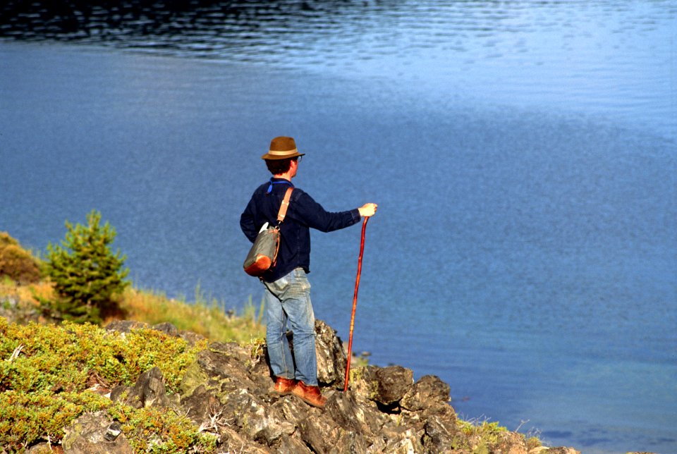 Hiker hiking East Lake Deschutes National Forest, Newberry NVM.jpg